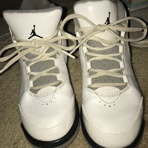 White and gray Jordans